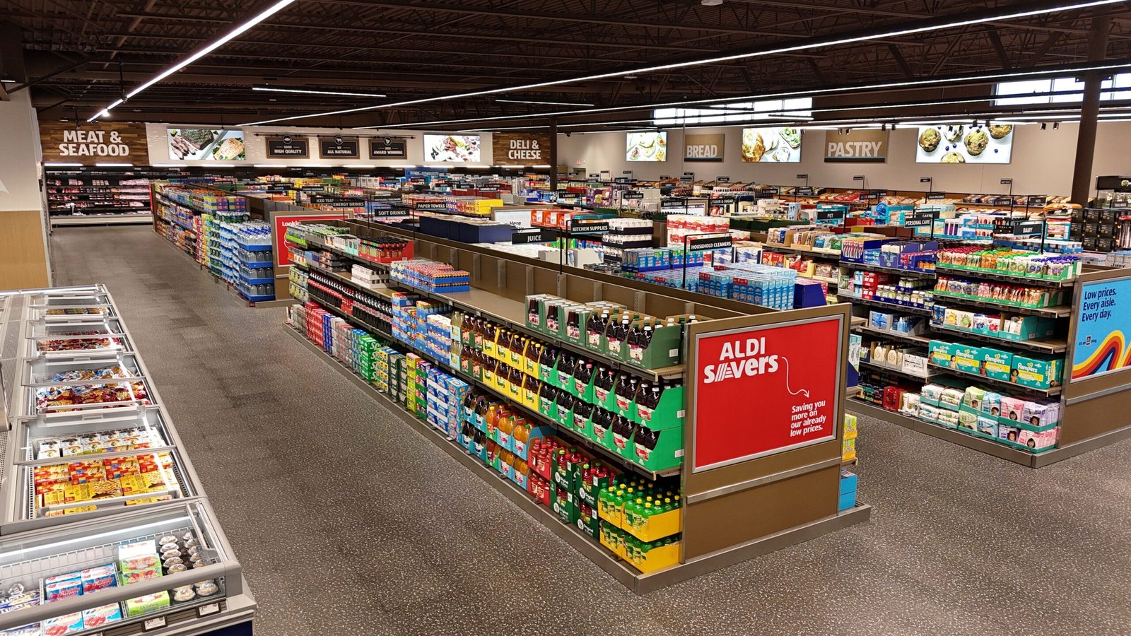 ALDI grocery store interior Grocery aisles and refrigerated cases inside an existing ALDI store