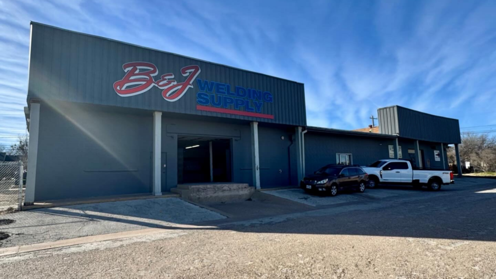 B&J Welding Supply storefront exterior with parked vehicles in Abilene