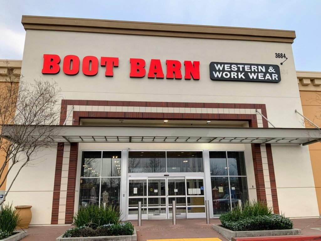 Boot Barn storefront with red lettering and Western and Work Wear sign