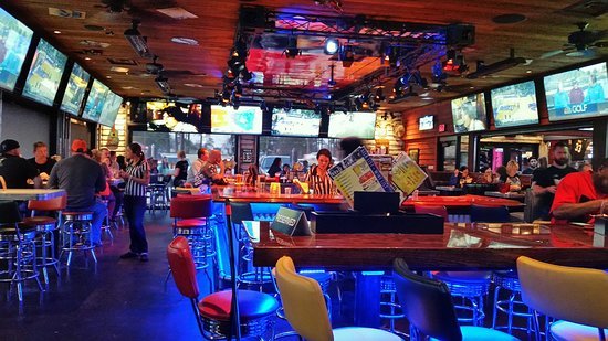 Bubba's 33 Sports Bar Interior Bubba 33's Interior with bar seating and televisions showing sports.
