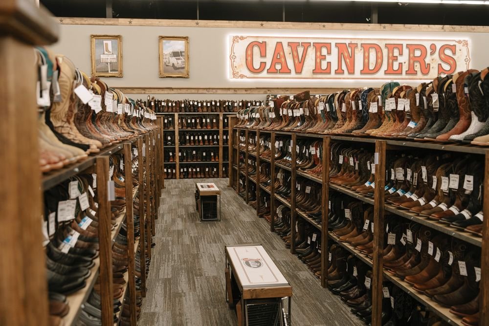 Rows of western boots inside a Cavender's Boot City store