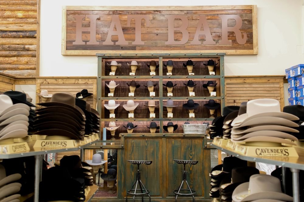 Cavender's Hat Bar with cowboy hats displayed inside a store