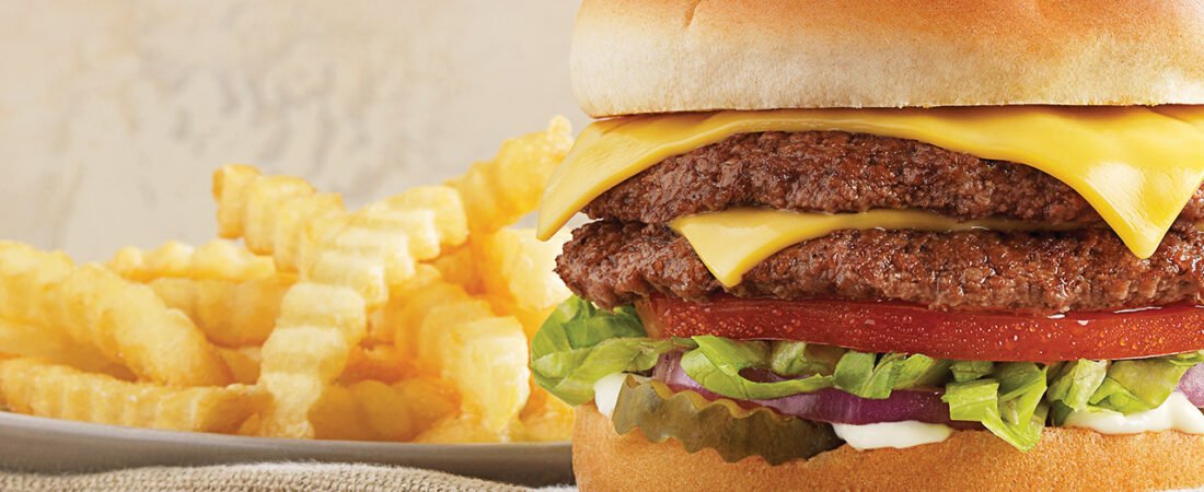 Culver’s Double Cheeseburger and Fries Culver’s double cheeseburger with lettuce, tomato, onions, and crinkle-cut fries.