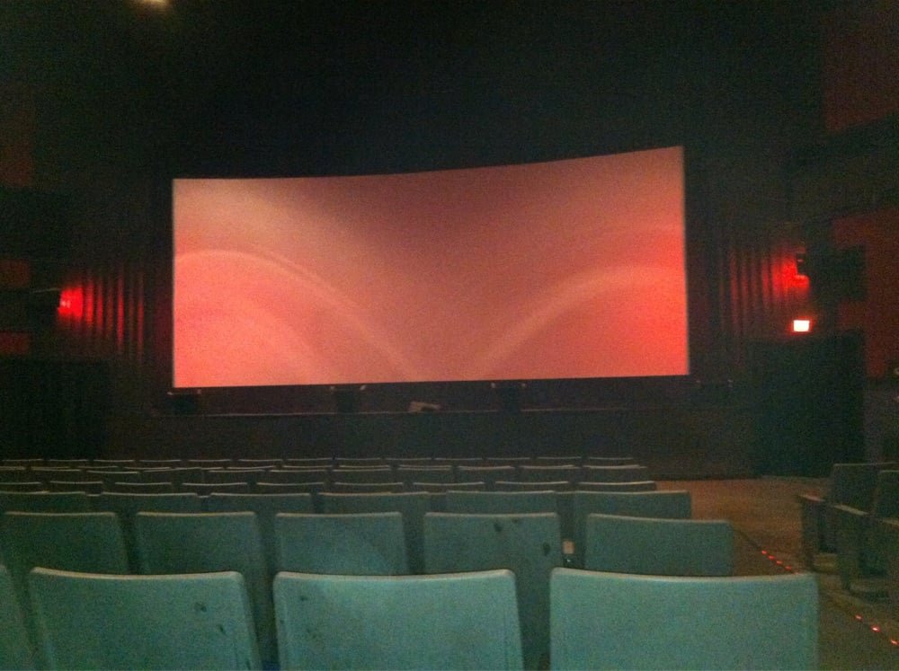 Rows of seats facing the screen inside the Fain Theater in Livingston
