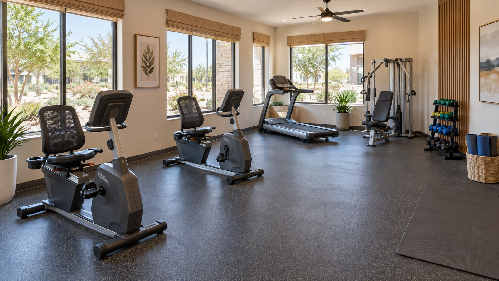 Illustrative fitness room for Latern at Robstown with recumbent bikes, a treadmill, strength equipment, and an open stretching area