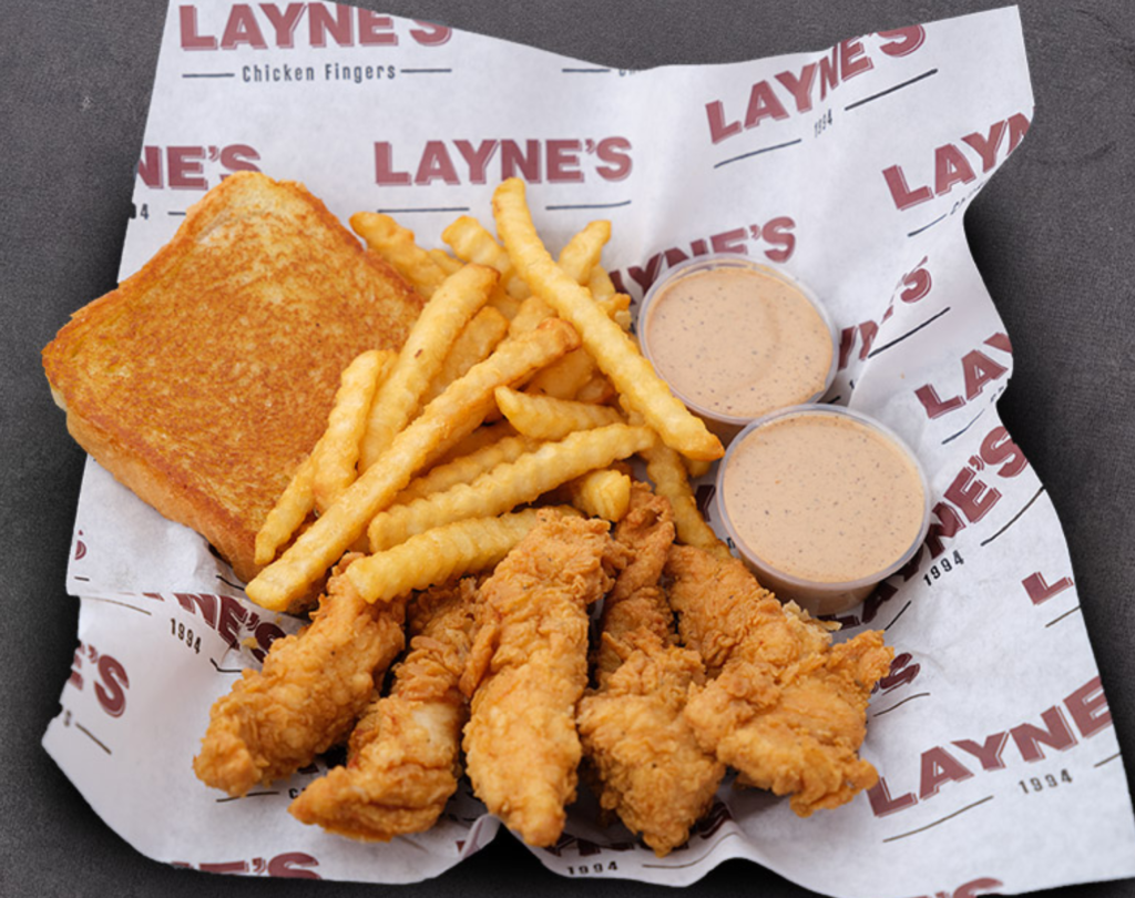 Layne's chicken fingers with crinkle-cut fries, Texas toast, and dipping sauce