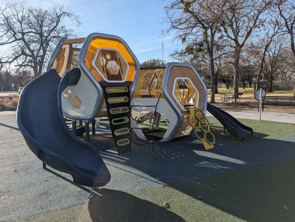 Existing playground with slides and climbing features at Rick Oden Park in Garland