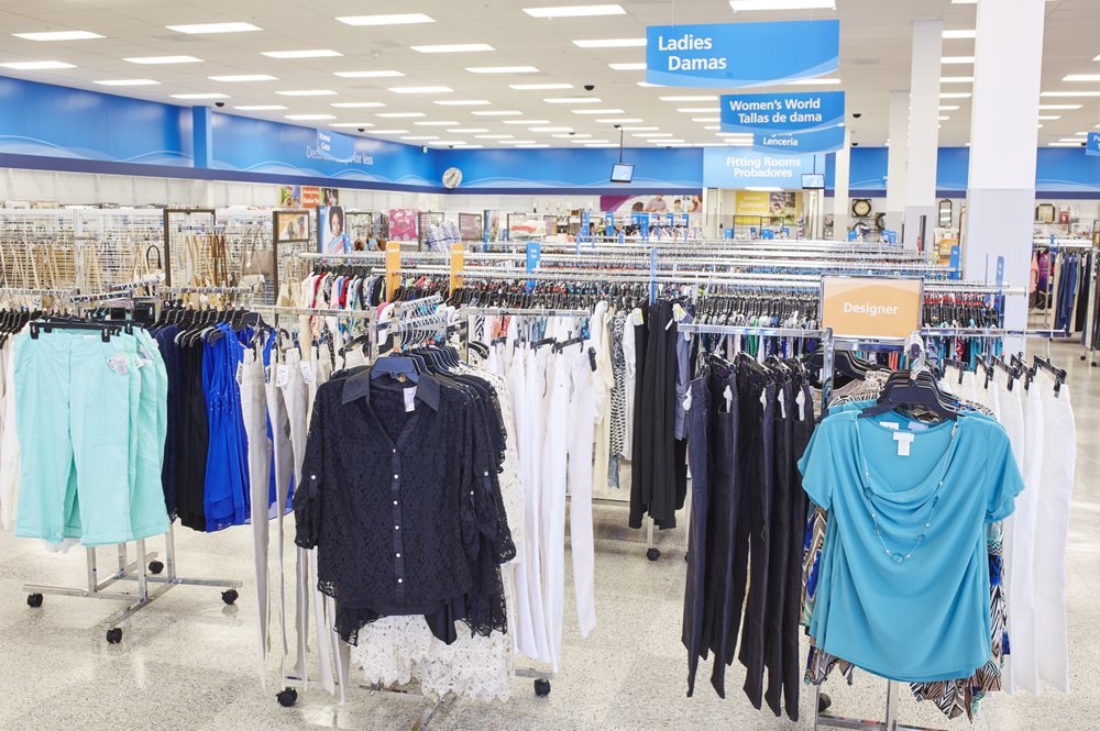 Ross Dress for Less Clothing Department Clothing racks and blue department signs inside a Ross Dress for Less store
