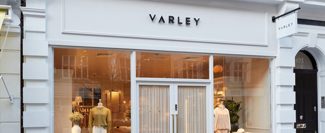 Existing Varley storefront with white facade, display windows, and black signage
