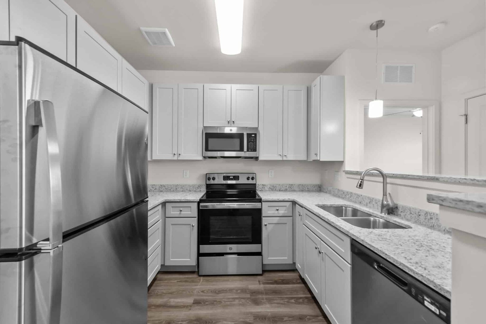 Wayfare Apartment Kitchen Wayfare apartment kitchen with white cabinets and stainless steel appliances