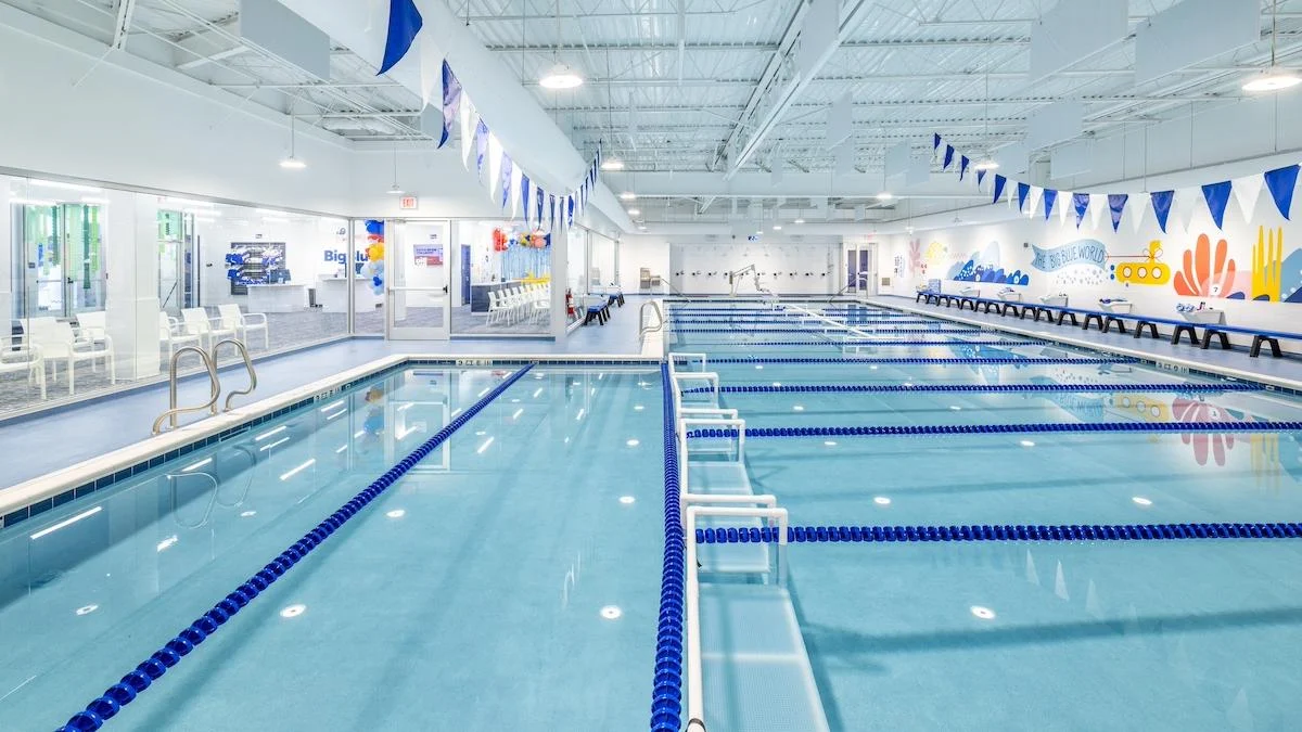 Big Blue Swim School — Representative Pool Interior Representative Big Blue Swim School indoor pool with divided swimming lanes