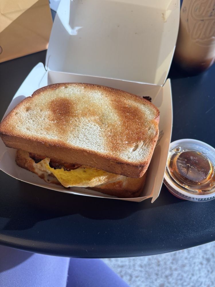 candy cloud bacon egg cheese melt Representative Candy Cloud bacon egg and cheese breakfast sandwich