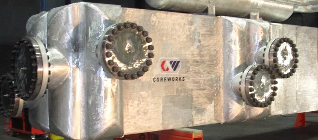 CoreWorks equipment on stands inside a manufacturing shop