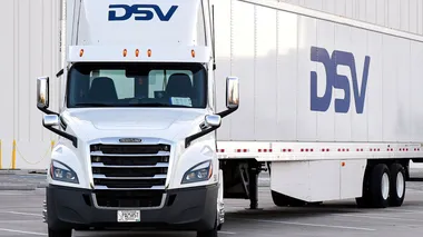 DSV-branded truck and trailer illustrating the transport services behind the DSV Denton logistics expansion