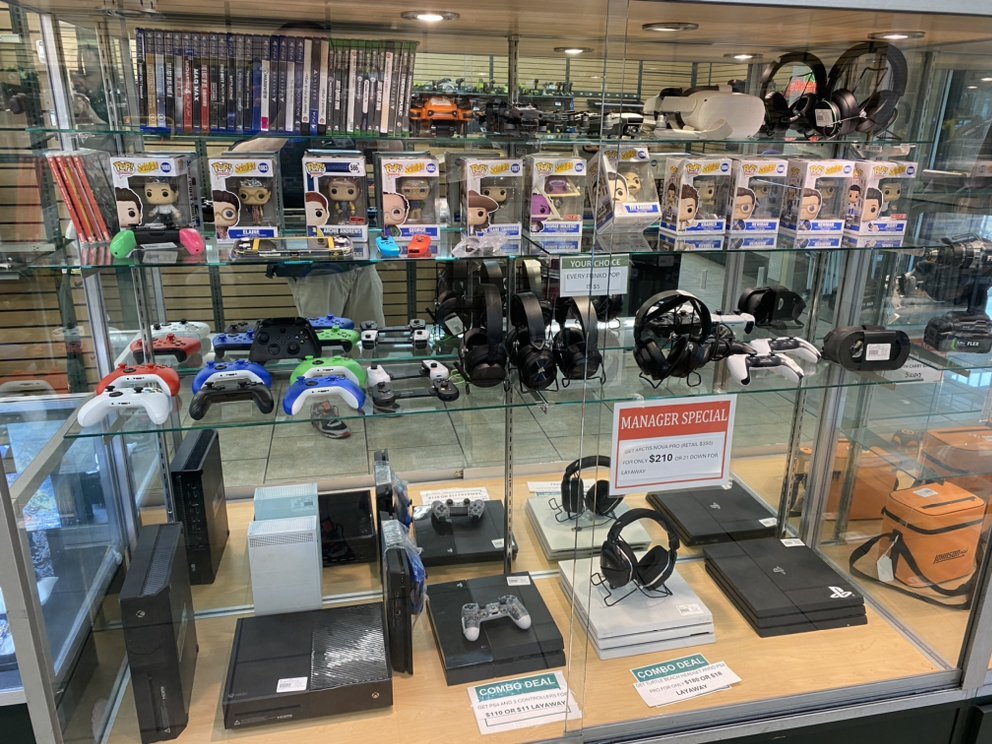 Representative electronics display illustrating retail merchandise for First Cash Pawn in New Braunfels