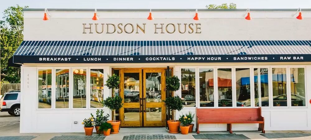 hudsonhouseexterior Exterior of an existing Hudson House restaurant with striped awning and gold lettering