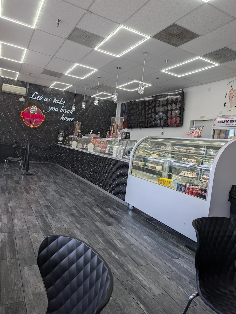 Display counters and seating inside an existing Kwality Ice Cream shop