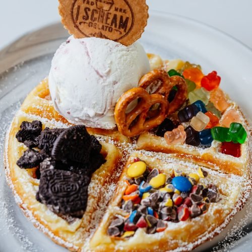 I Scream Gelato Loaded Waffle I Scream Gelato waffle topped with gelato, pretzels, crushed cookies, and colorful candy
