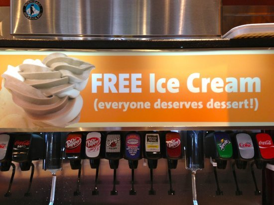Jason's Deli Free Ice Cream Sign Jason's Deli free ice cream sign above a self-service beverage station.