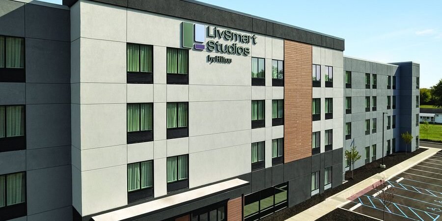 LivSmart Studios by Hilton exterior Four-story LivSmart Studios by Hilton hotel exterior