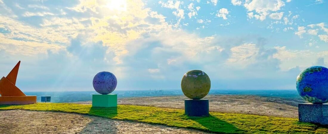 Planetary sculptures on a hilltop at Pearsall Park in San Antonio.