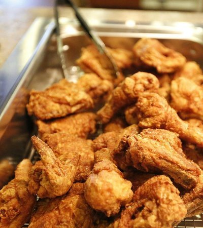 Pizza Ranch Crispy Chicken Golden fried chicken pieces in a Pizza Ranch buffet tray.