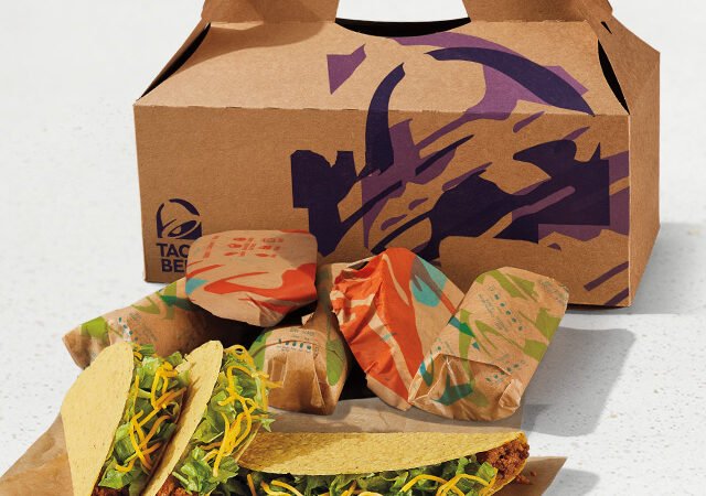 Tacos and wrapped menu items in Taco Bell packaging, illustrating Taco Bell Granbury restaurant plans