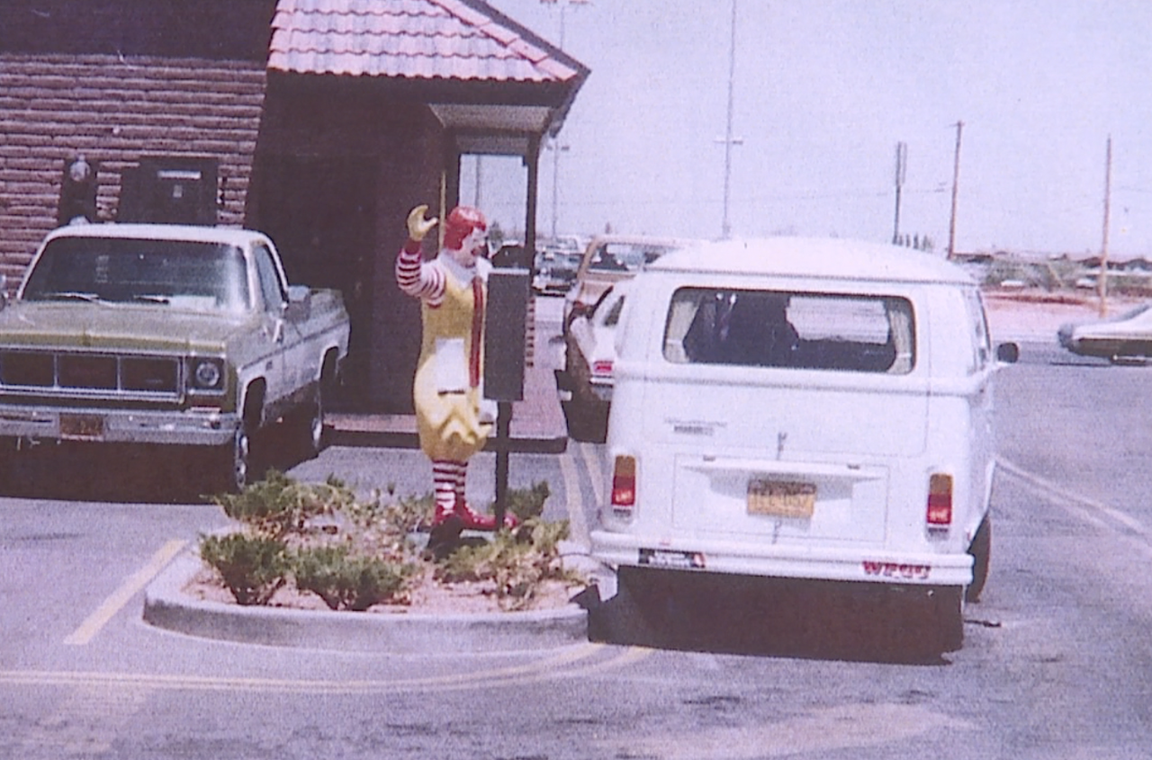 McDonald's Early Drive-Thru — Historic Image Historic McDonald's drive-thru with a Ronald McDonald figure beside the ordering area